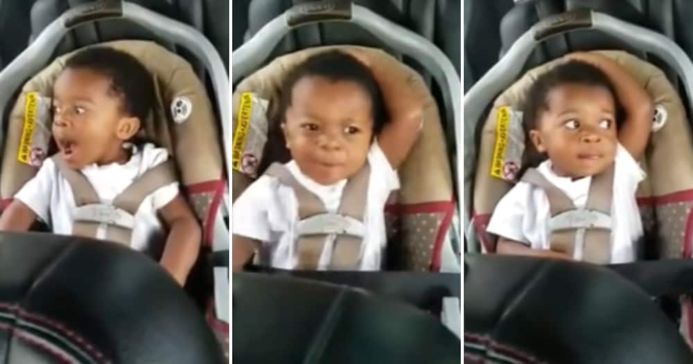 Toddler in his car seat singing Gospel music
