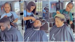 "You do home service?" Video of pretty female barber sparks mixed reactions, her skills excite Nigerian men