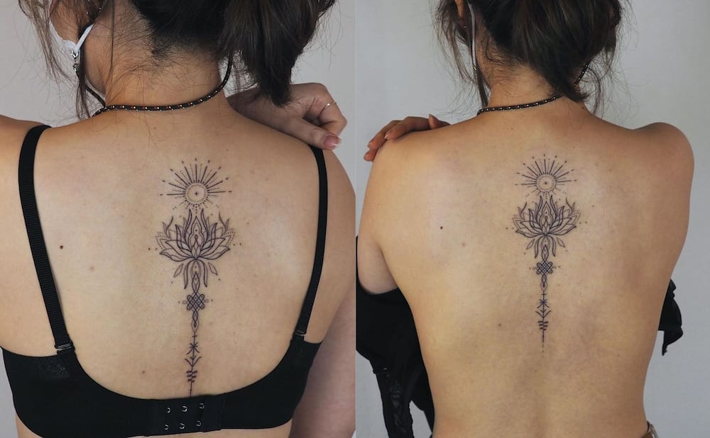 Lotus flower facing the sun tattoo