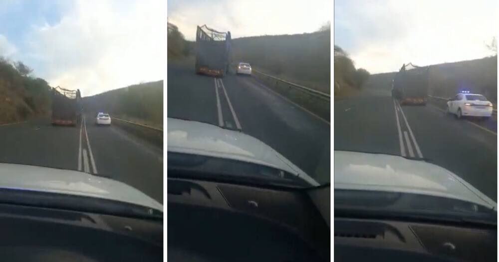 A lorry nearly ran a car into a rail barrier.