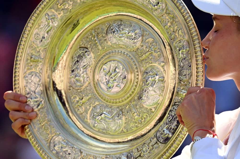 Elena Rybakina celebrates winning the Wimbledon title