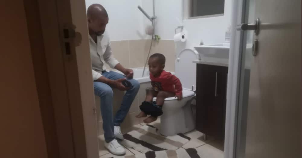 LOL: Dad Holds Phone While Son Takes Poo, Has Parents Sharing #PottyTrainingFails