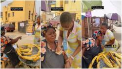 Emotional moment lady surprises roasted plantain seller with wad of cash, woman breaks down in tears
