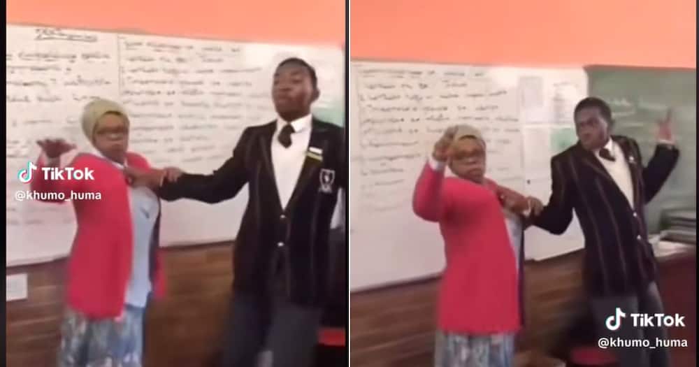 SA teacher dances with student