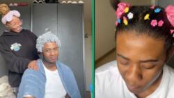 Cape Town woman styles boyfriend’s hair with ribbons and colourful pins because he won’t cut it