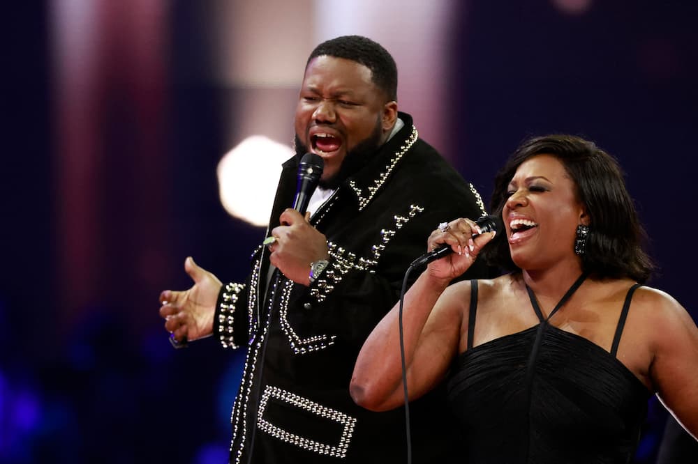 Michael Trotter Jr. and Tanya Trotter perform on stage