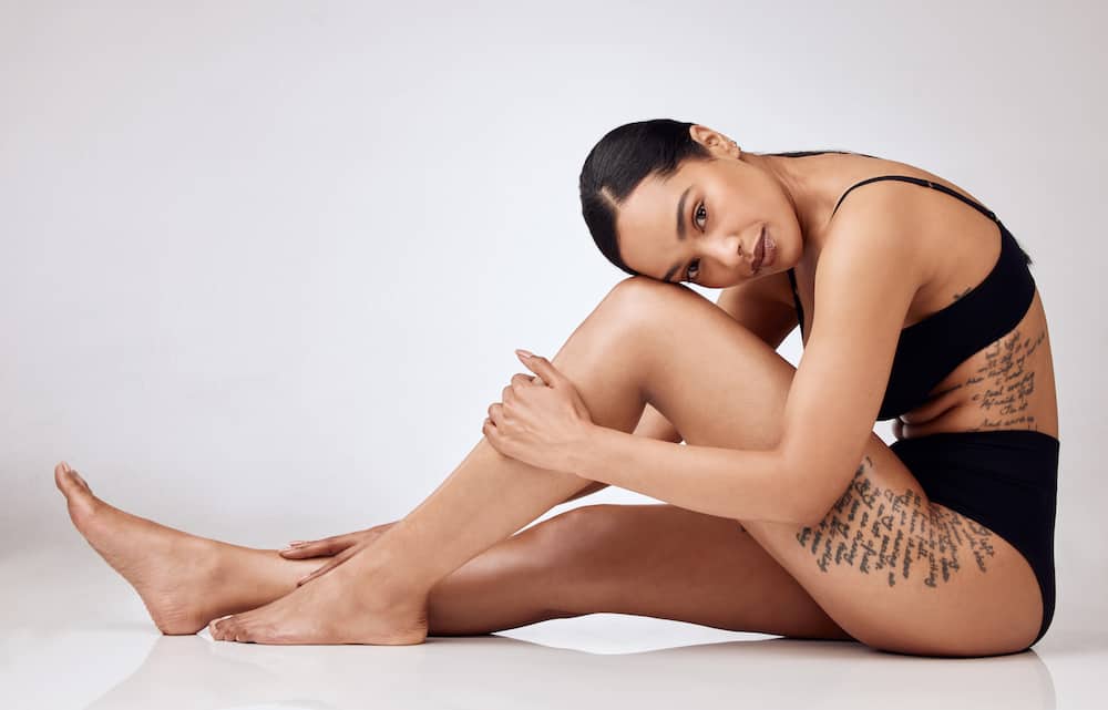 Women's unique thigh tattoos