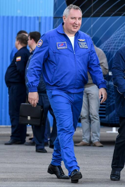 Russian space agency Roscosmos head Dmitry Rogozin walks prior to the launch of the Soyuz MS-10 spacecraft in Kazakhstan in October 2018