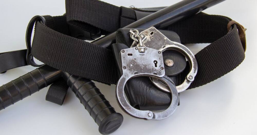 Hand cuffs and police baton