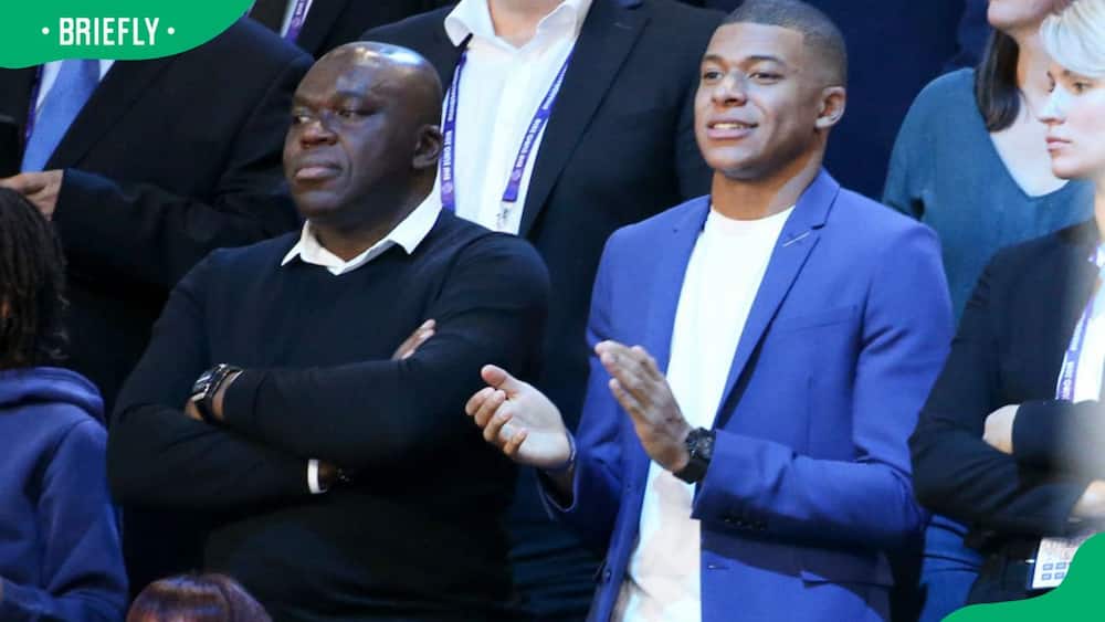 Kylian Mbappé and his father Wilfried Mbappé attending the EHF Women's Euro Final match