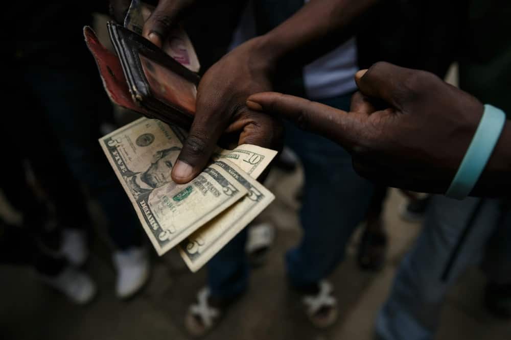Give us greenbacks: For many Zimbabweans, the US dollar is the currency of choice