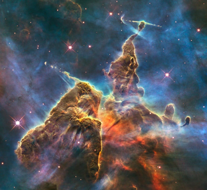 Carina Nebula is famous for its towering pillars that include "Mystic Mountain," a three-light-year-tall cosmic pinnacle captured in an iconic image by the Hubble Space Telescope, until now humanity's premier space observatory