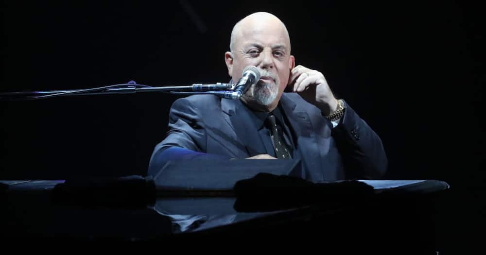 Why did Billy Joel spilt with his band?