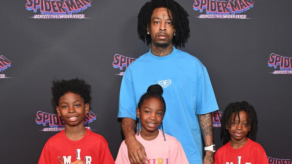 21 Savage with kids at the screening of Spider-Man: Across The Spider-Verse at Regal Atlantic Station in June 2023.