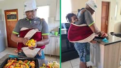 South African super dad wins hearts with cooking while carrying baby