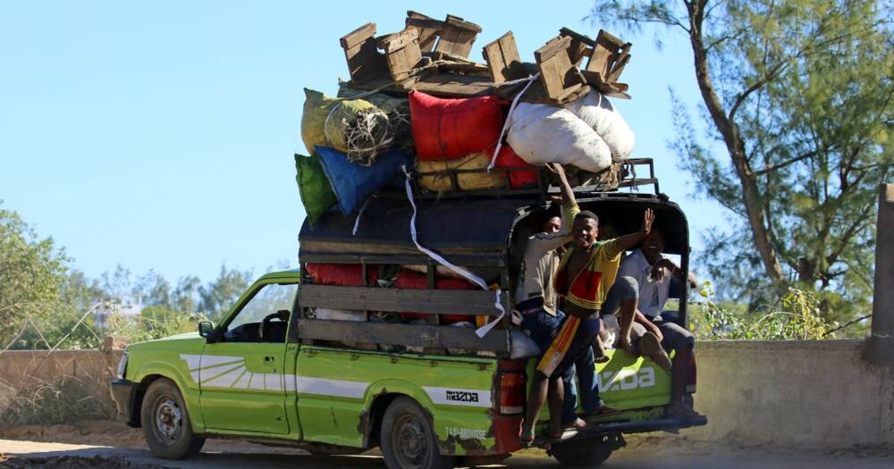 Overloaded transport pictures: If ever a car was going to break