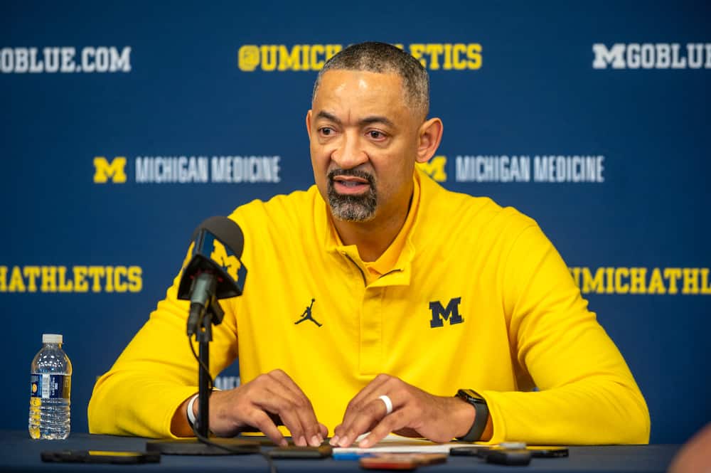 Juwan Howard of the Michigan Wolverines speaks to media during the post game press conference