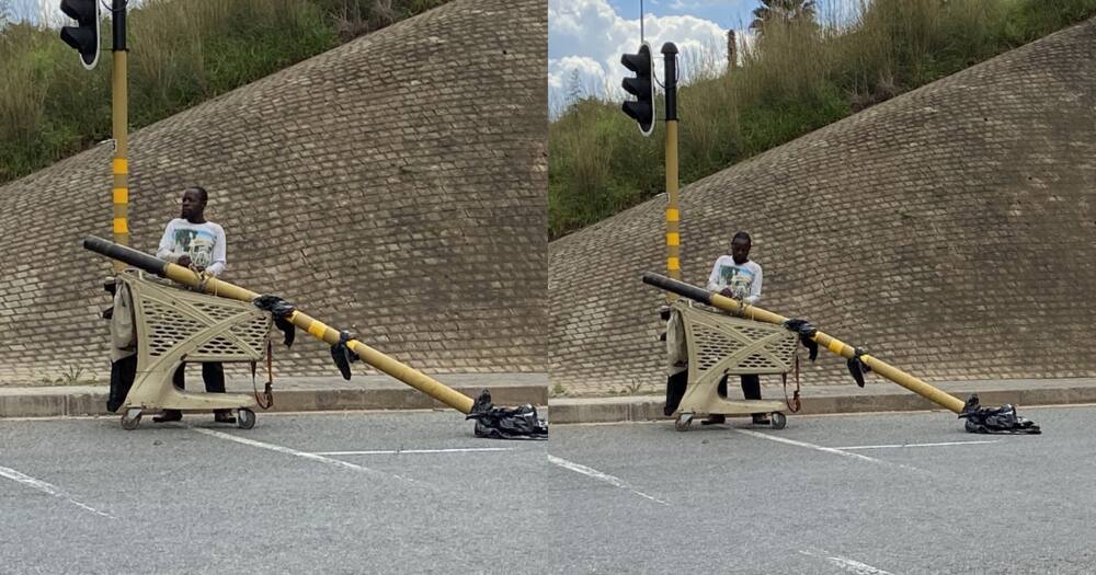 Mzansi Left Divided by Man Taking Traffic Light Using a Trolley