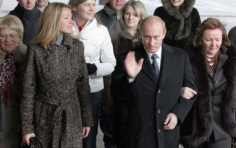 Vladimir Putin, Lyudmila, and daughter Maria at a Moscow polling station.
Source: ALEXANDER NEMENOV/Getty Images.