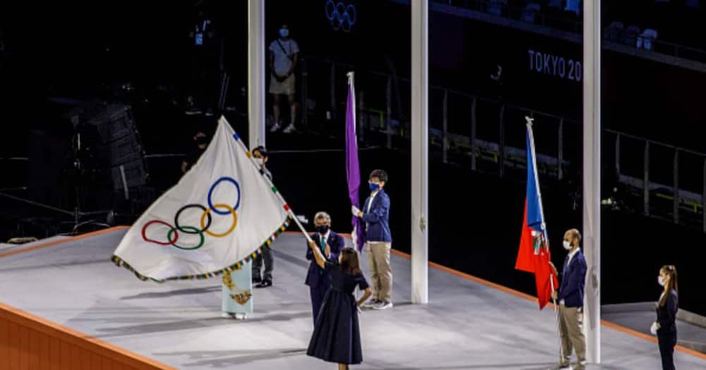 Closing ceremony at the Olympic Stadium. The Mayor of Paris, the next venue of the Olympic Games, Anne Hidalgo, waves the Olympic flag. (Photo by Ayman Aref/NurPhoto via Getty Images)