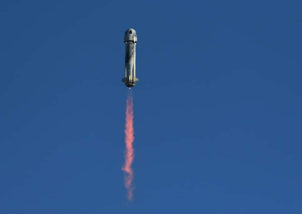A Blue Origin New Shepard rocket launches from Launch Site One in West Texas north of Van Horn