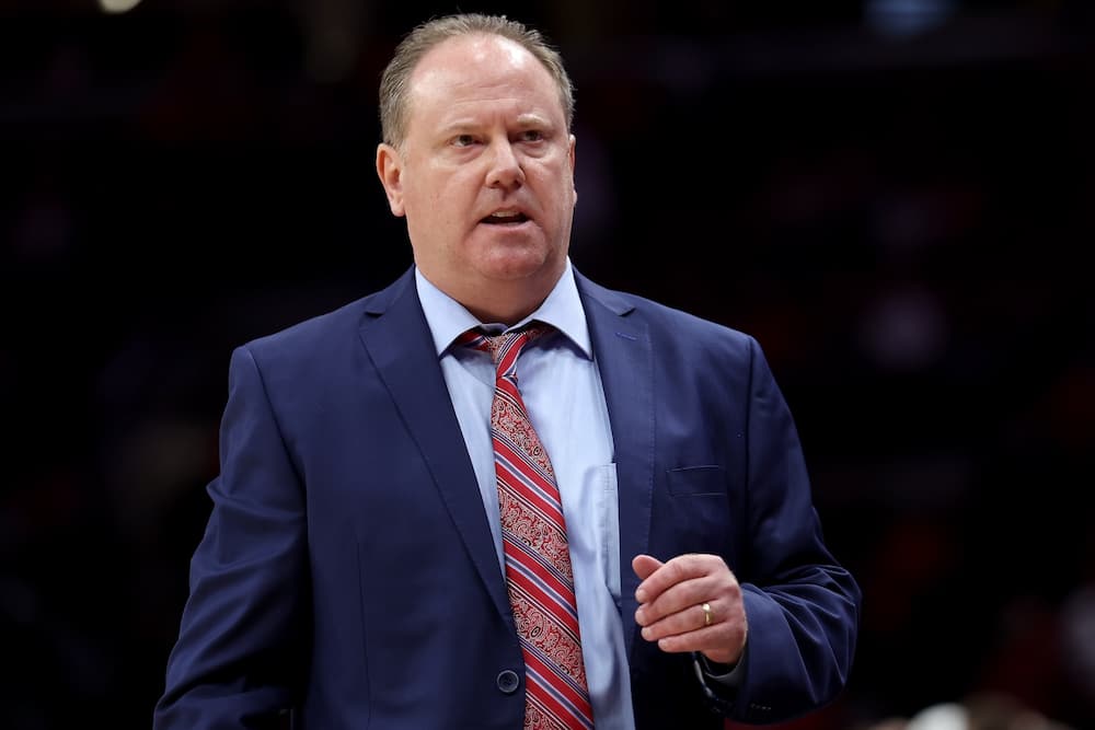 Greg Gard of the Wisconsin Badgers walks up the sideline during the game against the Ohio State Buckeyes