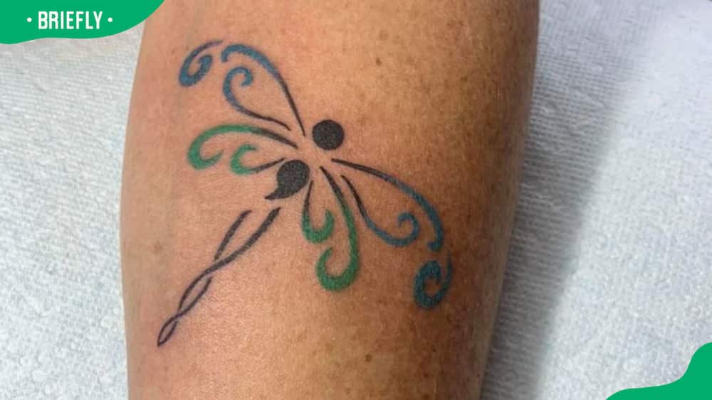 Dragonfly semicolon tattoo