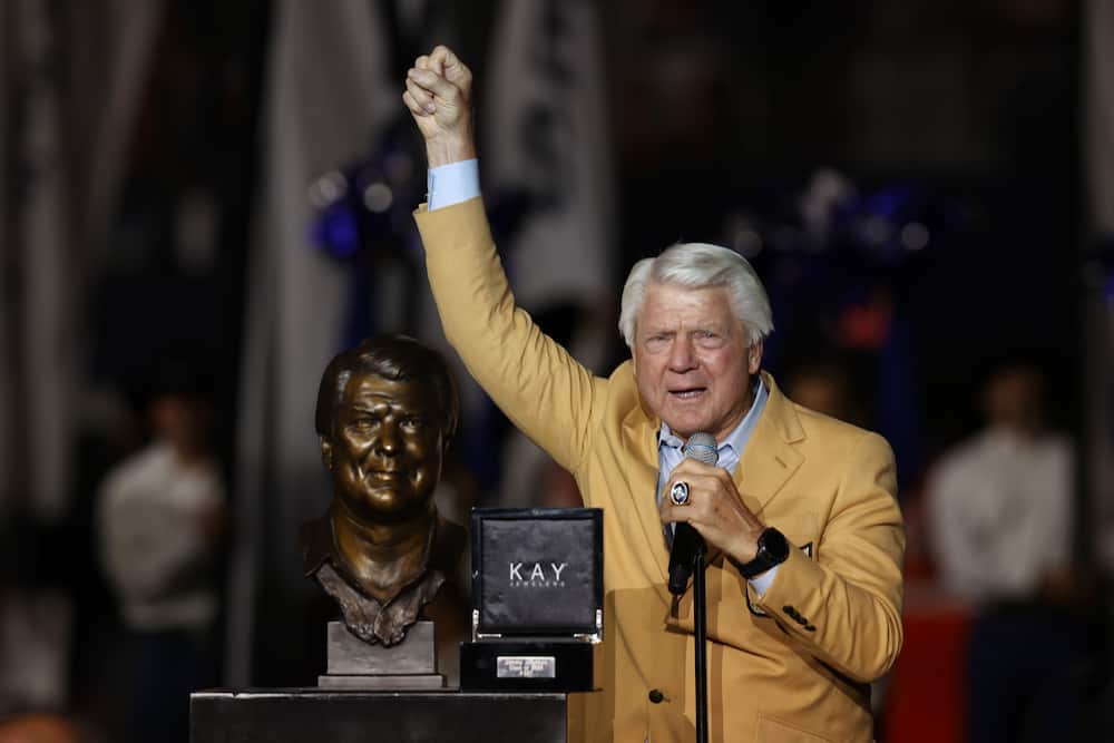 Jimmy Johnson celebrates receiving his Hall of Fame ring at halftime