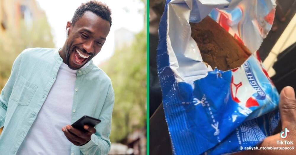 Stock photo of man laughing and soil in washing powder wrapper