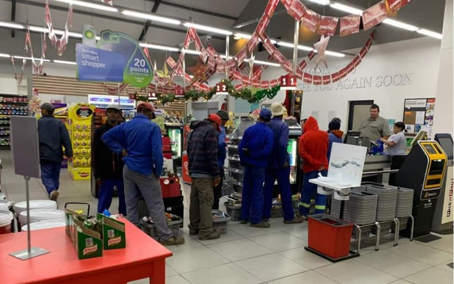 Heart-warming photo shows farmer buying groceries for his workers