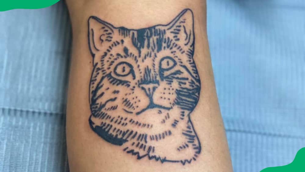 Stamp cat tattoo