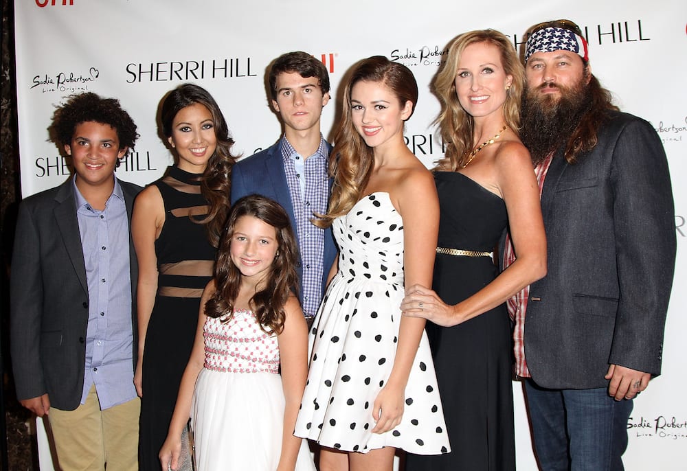 Will Jr, Rebecca Robertson, Bella, John Luke, Sadie, Korie, and Willie Robertson (left to right) in 2013.