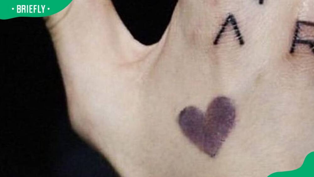 Jungkook's purple heart tattoo