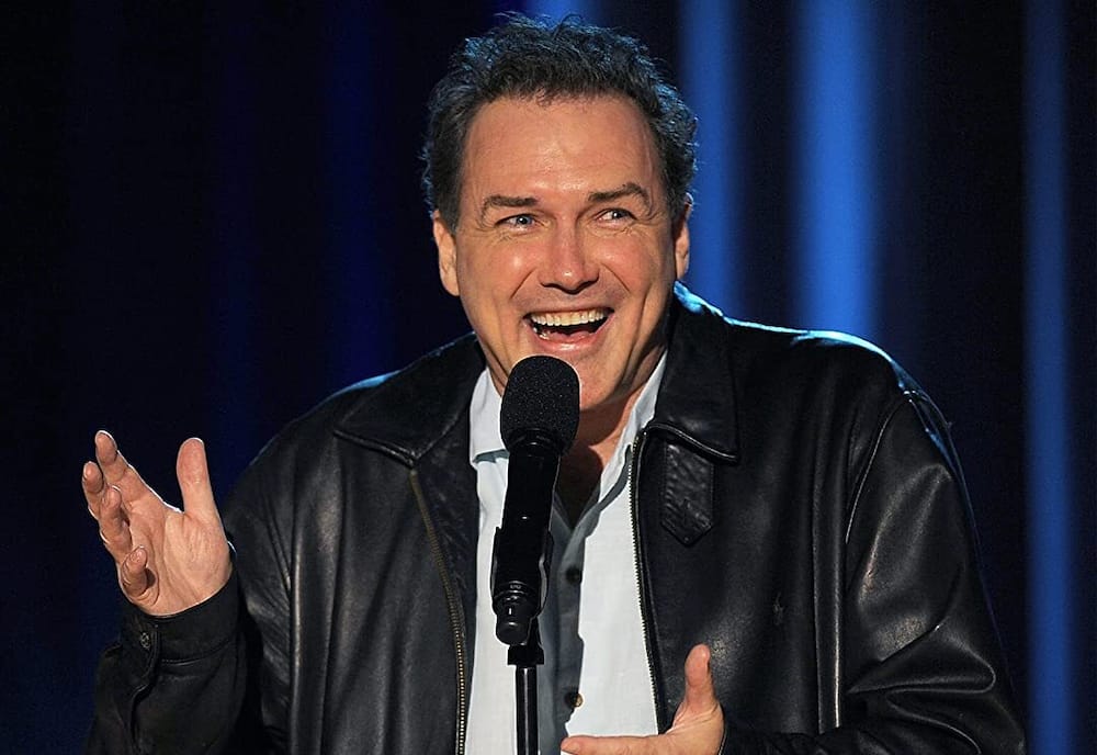 Norm Macdonald on set of one of his stand-up shows.