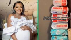 Woman shows off piles of nappies and wipes collected at baby daddy’s nappy braai: Mzansi claps