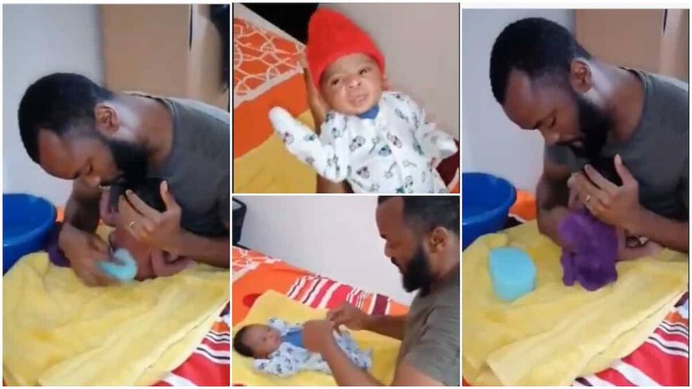 Heartwarming moment father bathes newborn baby, clothes him, his video recieves massive praise