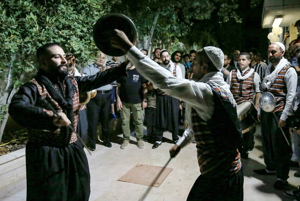 Syrian "Arada" folklore dancers of the "Bab al-Hara" troupe perform while in traditional dress