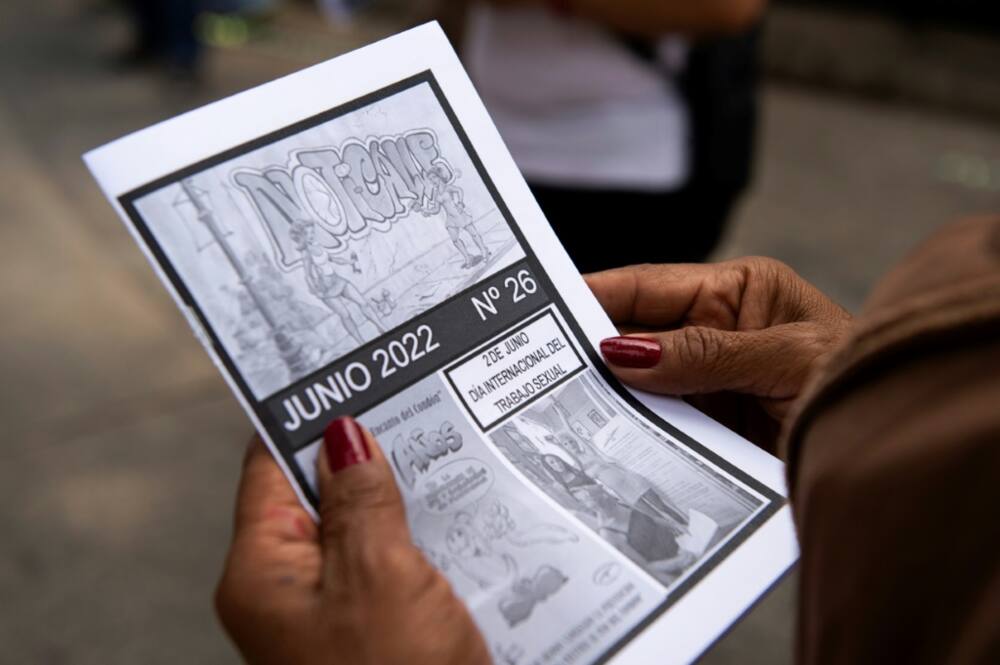 A woman in Mexico City reads Noticalle, a free monthly magazine produced by sex workers for their colleagues
