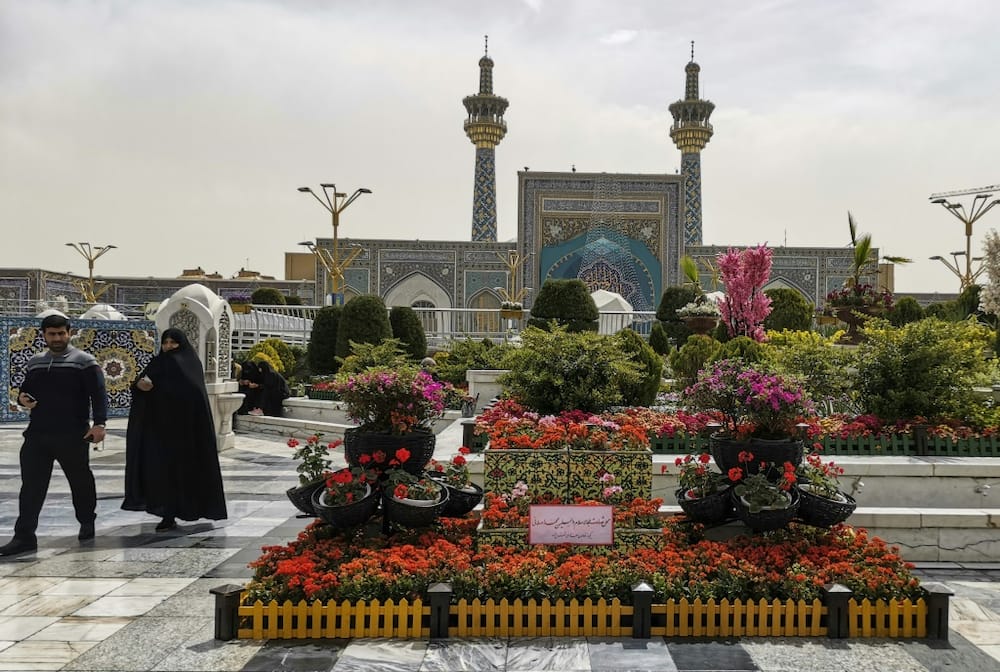 Iranians visit the spot in the courtyard of Imam Reza shrine in Mashhad city on April 6, 2022, where a day earlier an attacker stabbed three clerics, two of them fatally