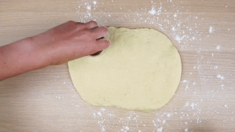 Cut out the dough with a round cookie cutter.