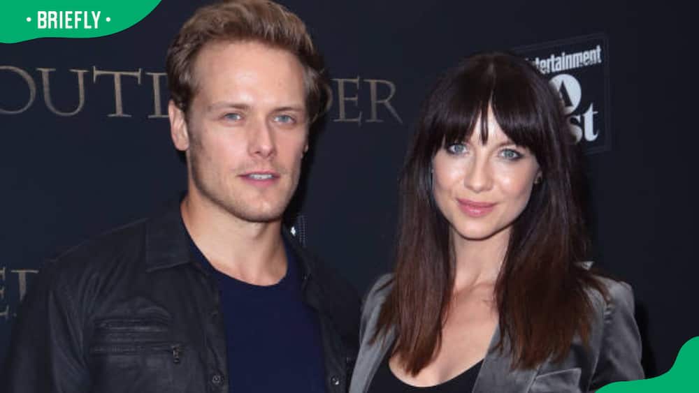 Sam Heughan and Caitriona Balfe at an event