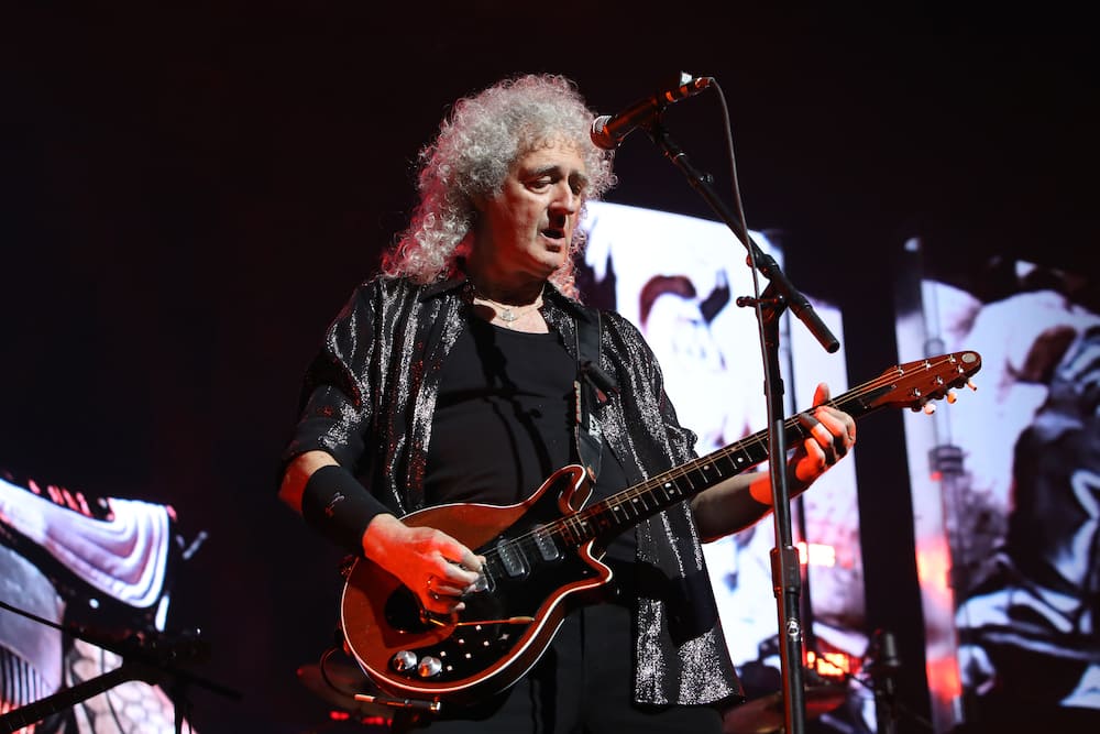 Brian May of Queen + Adam Lambert performs at Scotiabank Arena