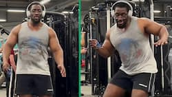 Fit guy flexes his muscles while dancing to a catchy bacardi song