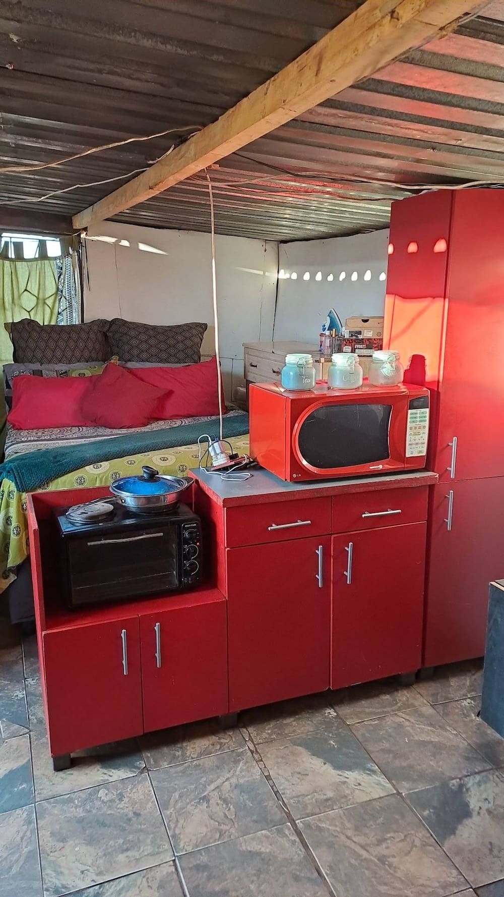 Woman shares photos of her kitchen and bedroom.