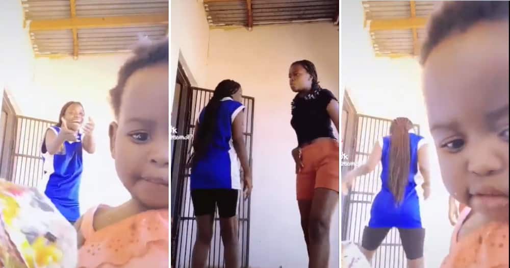 A little girl getting in the way of a dance challenge clip