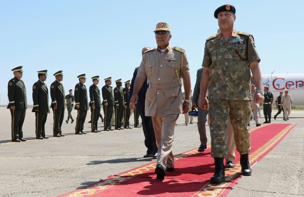 General Abdel Razaq al-Nadhouri (C), second in command of the forces of eastern-based strongman Khalifa Haftar, made an unprecedented visit to Tripoli on Monday and Tuesday to meet with his counterpart in the west, General Mohammad al-Haddad