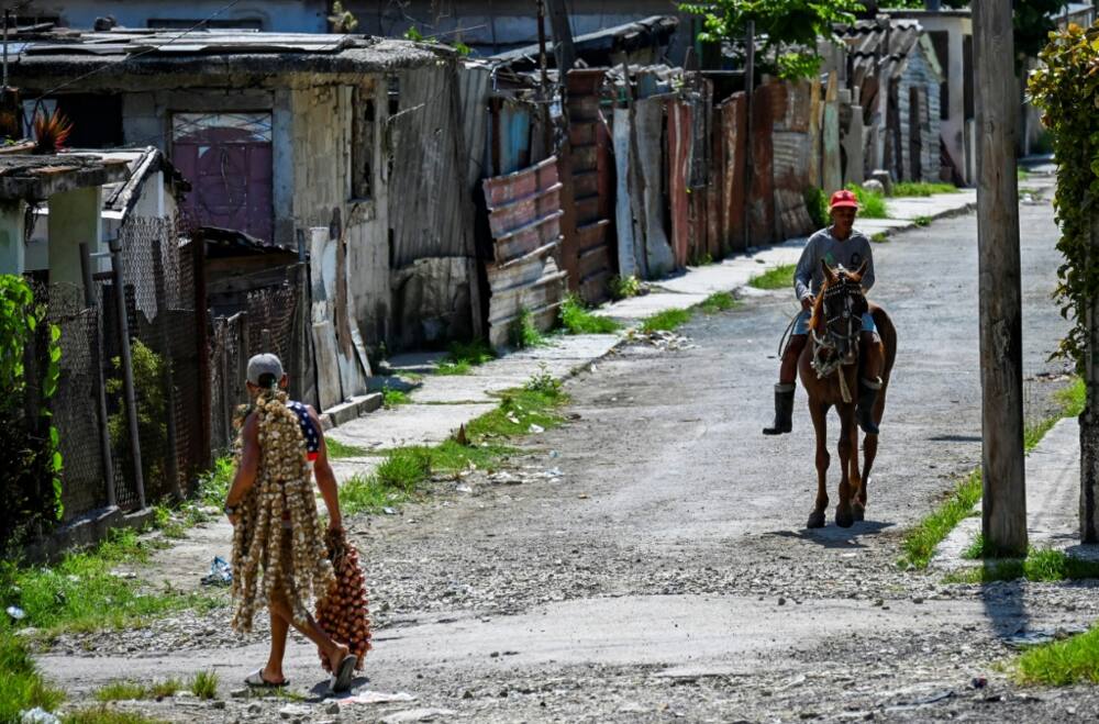 A street in the neighborhood of La Guinera on the outskirts of Havana is seen in June 2022 A street in the neighborhood of La Guinera on the outskirts of Havana is seen in June 2022