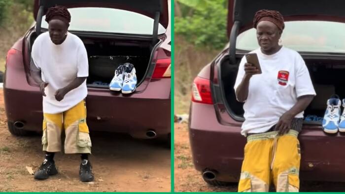 Older woman sags her baggy shorts in video, flaunts iPhone with triple camera