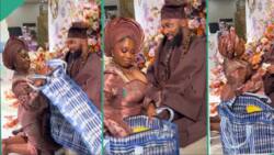 Nigerian lady attends her wedding with Ghana Must Go bag, collects bundles of money from her husband