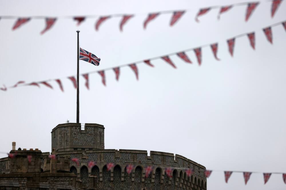 A Union flag flies at half-mast above Windsor Castle, west of London